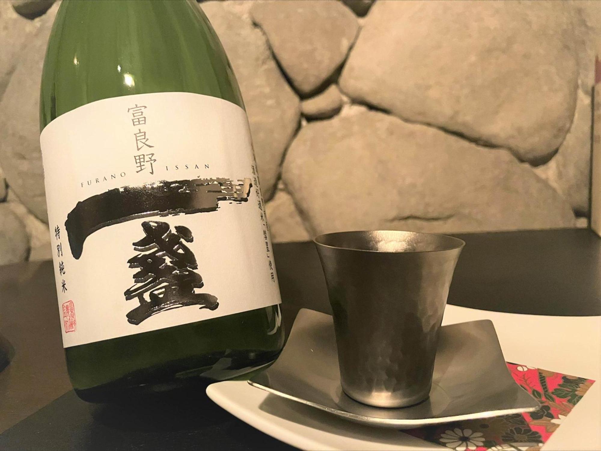 Shin Furano Prince Hotel Nakafurano Exterior foto A bottle of sake